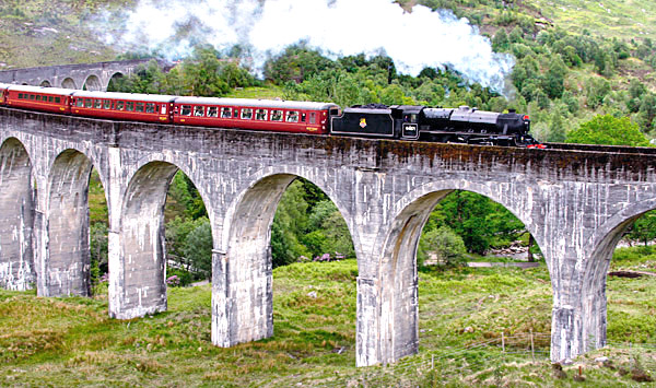 Train on the Glenfinnan viaduct, Scotland, UK